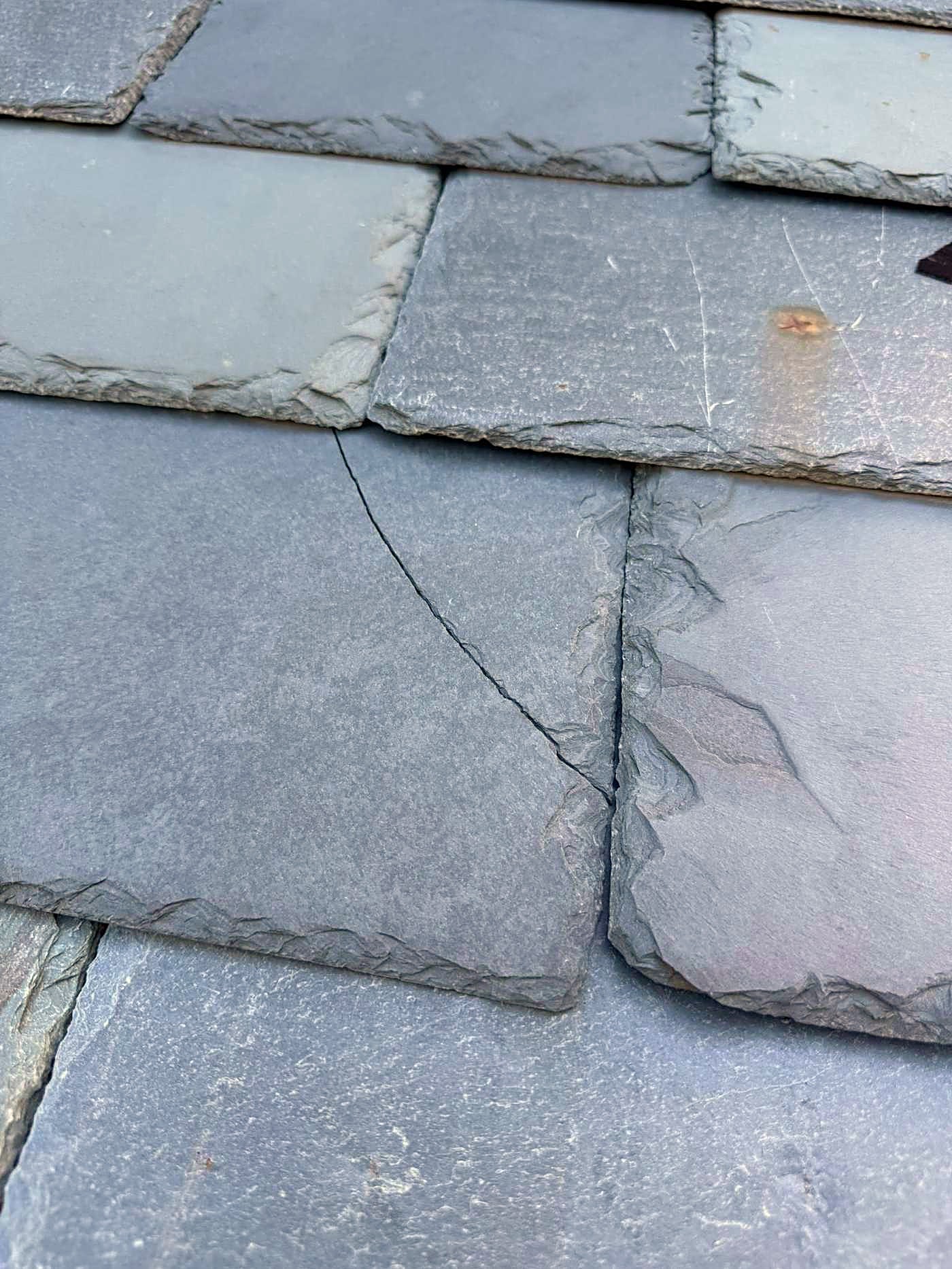A cracked slate tile, close up