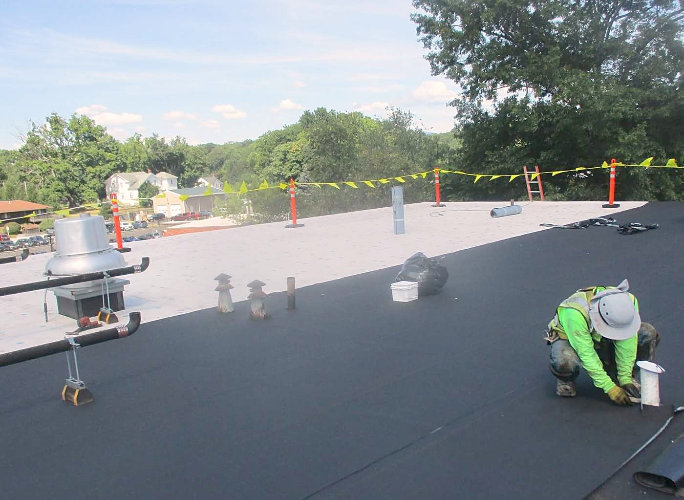 Low Slope and Flat Roofs by Texas Construction Group